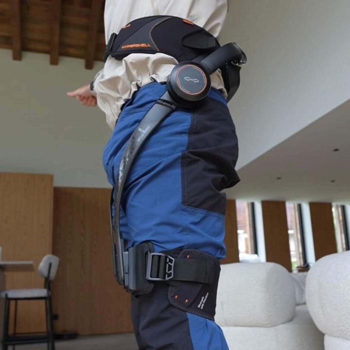 Electric carbon fiber knee power leg strength enhancement and assistive knee support