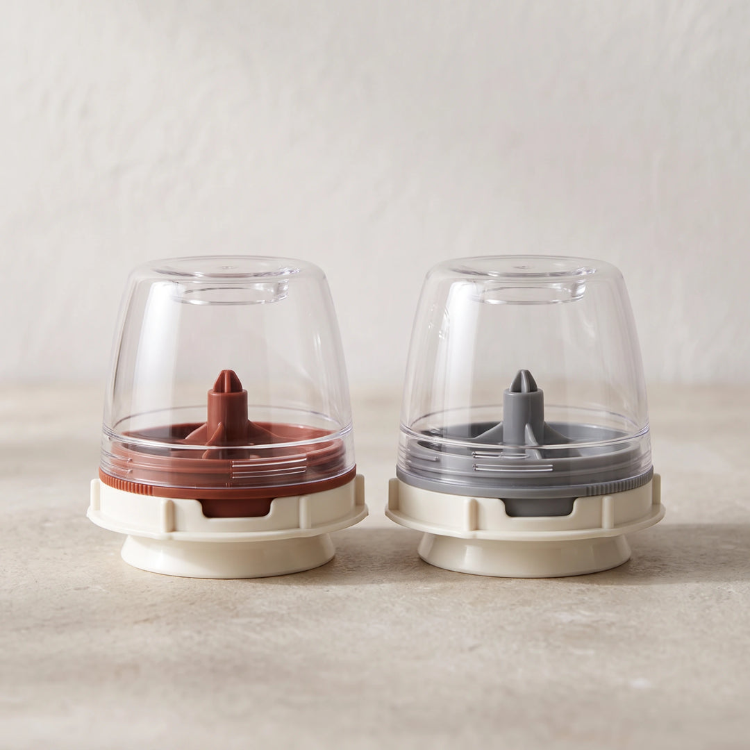 Two empty spice pods side by side