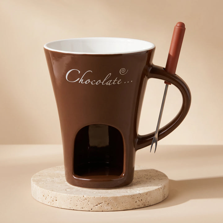 Brown ceramic chocolate fondue mug with dipping fork