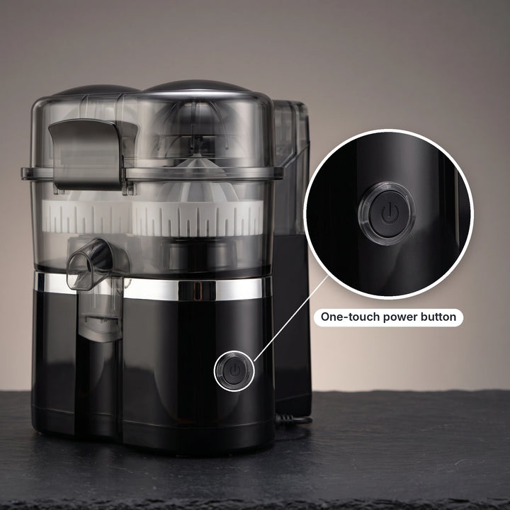 Black citrus juicer with a close-up of the one-touch power button