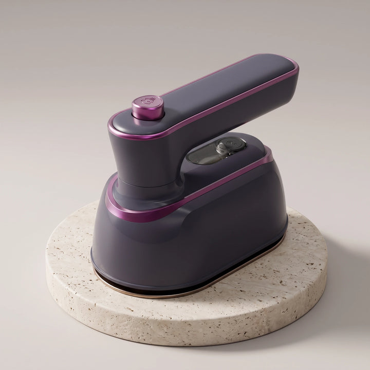Modern grey handheld steam iron with plum accents