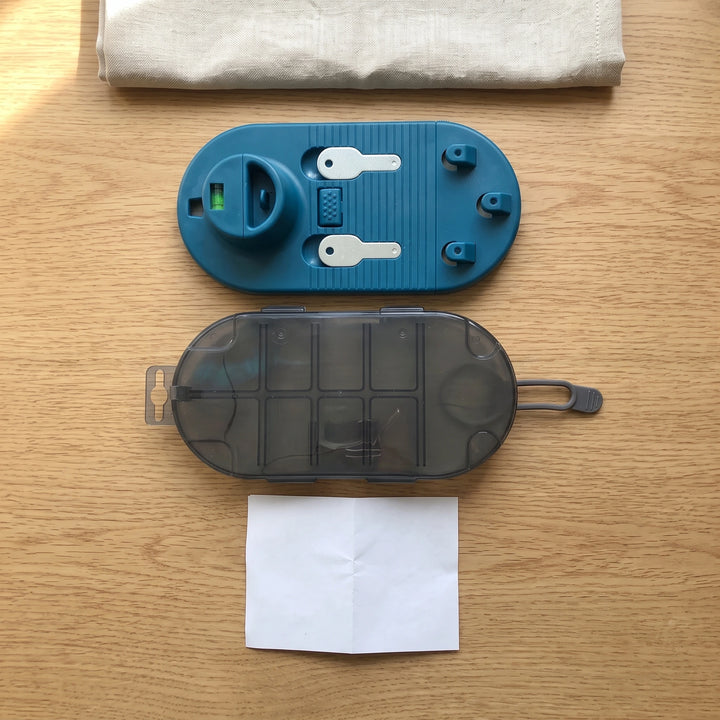 Picture hanging tool with clear storage case and instruction sheet