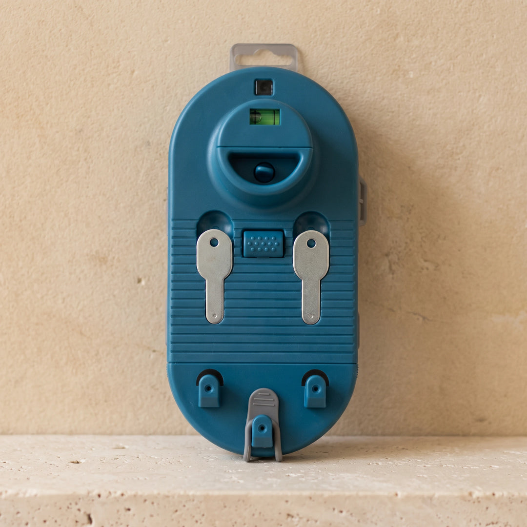 Front view of the picture hanging tool with bubble level and two metal hook plates