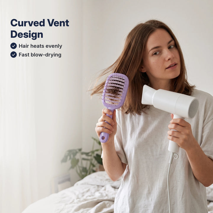 Woman blow-drying her hair with a purple vented hollow hair brush