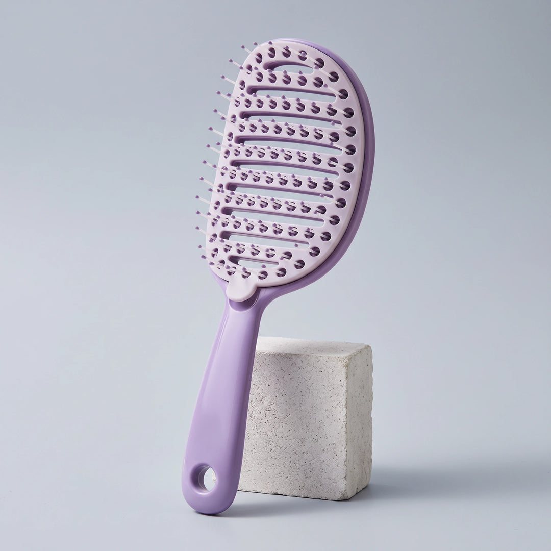 Ribbed comb with removable comb pad in taro purple